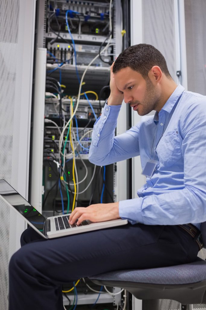 IT staffer overwhemled and working overtime because he needs co managed it support 